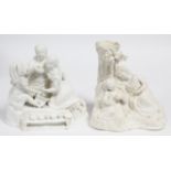 A Victorian parian group of three children at play, a toy tea service laid out before them, 6”