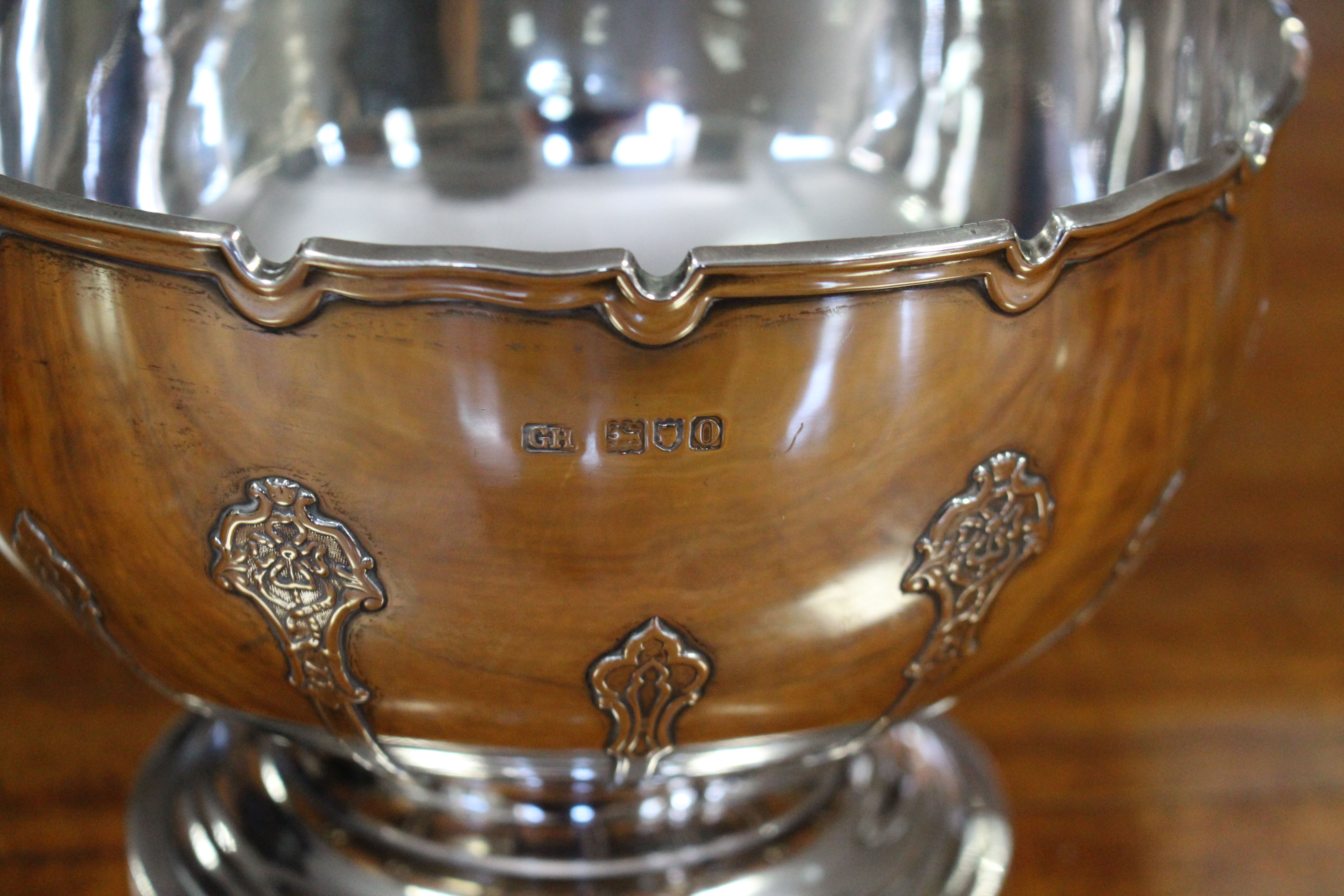 An Edwardian silver punch bowl with indented rim, the body decorated with raised strapwork, on round - Image 2 of 2