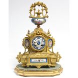 A 19th century French mantel clock in Louis XVI style gilt metal case inset Sevres-style bleu