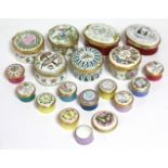 A collection of seventeen Halcyon Days decorated enamel small boxes of various shapes & sizes; &