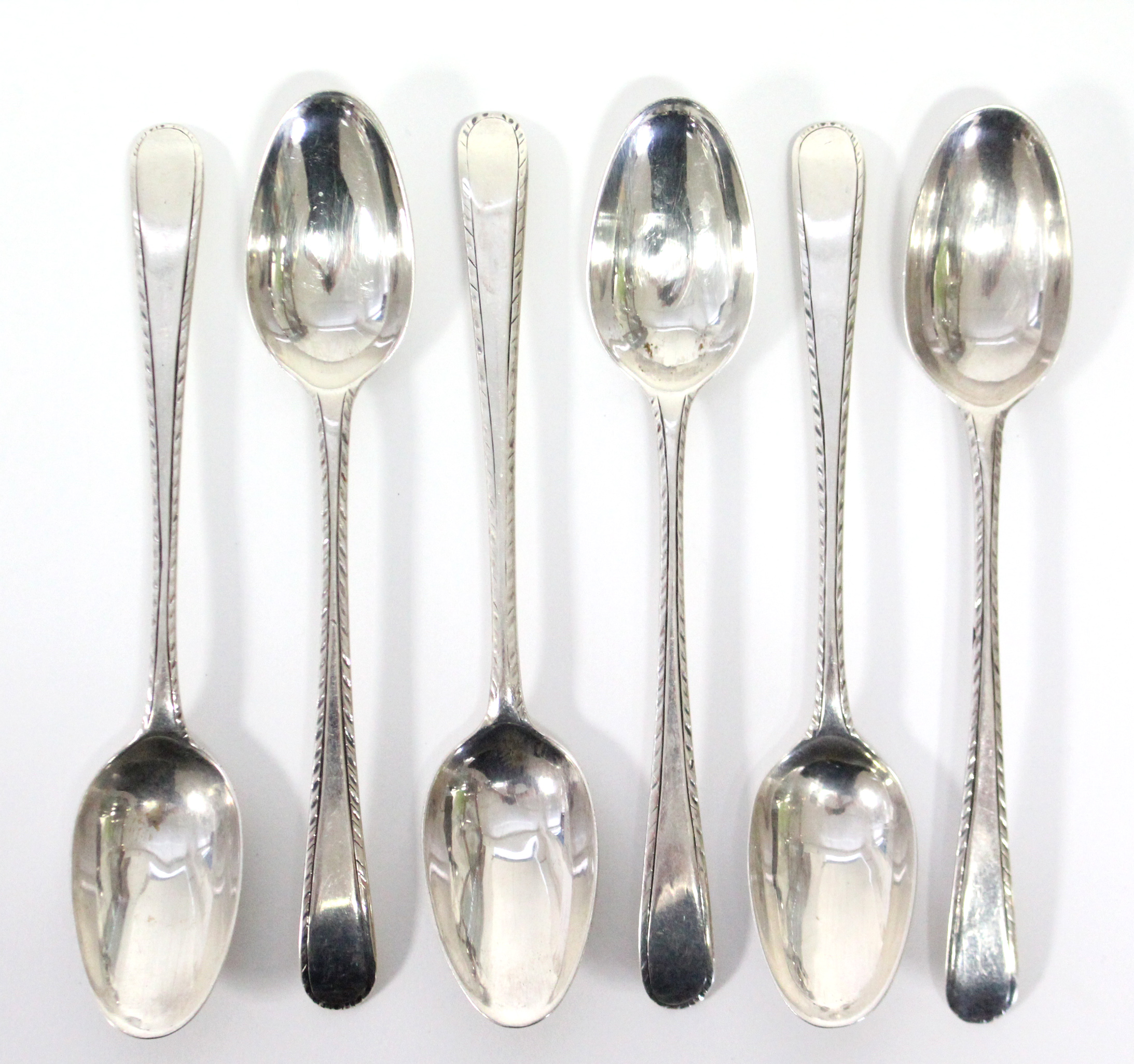 A set of six early George III silver Old English Feather-Edge teaspoons; lion passant & maker’s mark