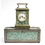 A late 19th century French striking mantel clock in brass rectangular case with painted lacquer