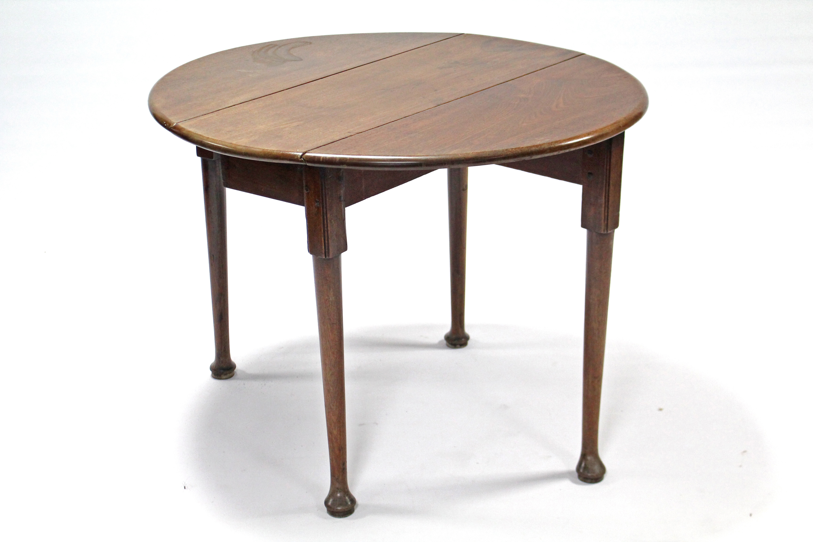 A Georgian mahogany drop-leaf supper table, with circular top on slender turned legs with pad - Image 2 of 3