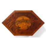 A late 18th century figured mahogany box of elongated hexagonal form, the hinged l id with inlaid