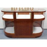A mahogany-finish bow front shop pedestal display unit, with glazed top & sides, each compartment
