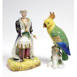 A Victorian Staffordshire porcelain standing male figure dressed as a Turk, on wide mound base,