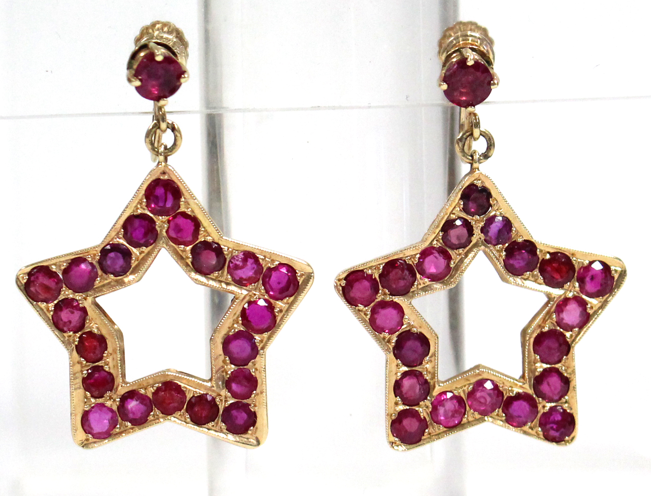 A PAIR OF RUBY PENDANT EARRINGS, each of open five-pointed star shape, set twenty round-cut stones - Image 2 of 6