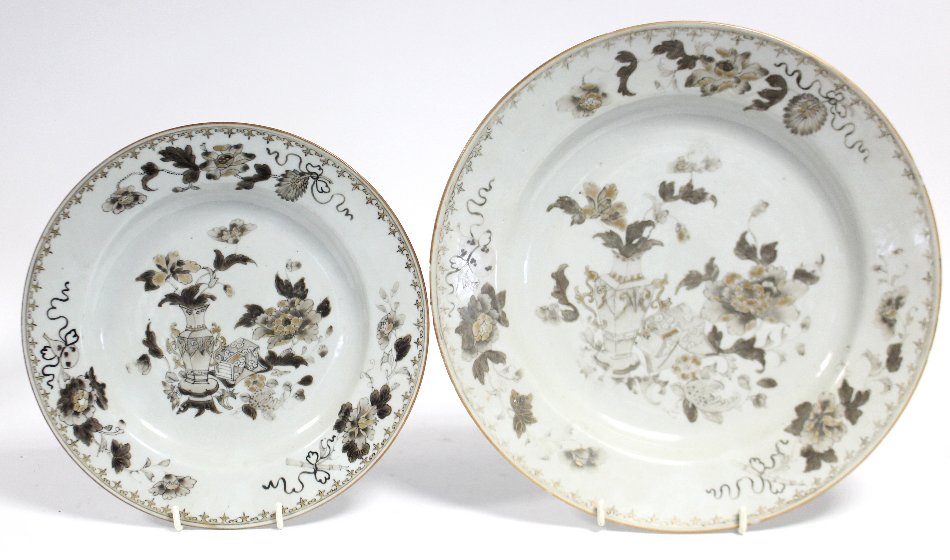 An 18th century Chinese porcelain large shallow dish painted en-grisaille & gilt with peonies & a