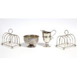 A pair of George V toast racks, each of four round-arch divisions, Birmingham 1915 by W. S. Hutton &