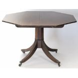 A Regency mahogany octagonal centre table, the tilt-top with reeded edge, on octagonal centre column