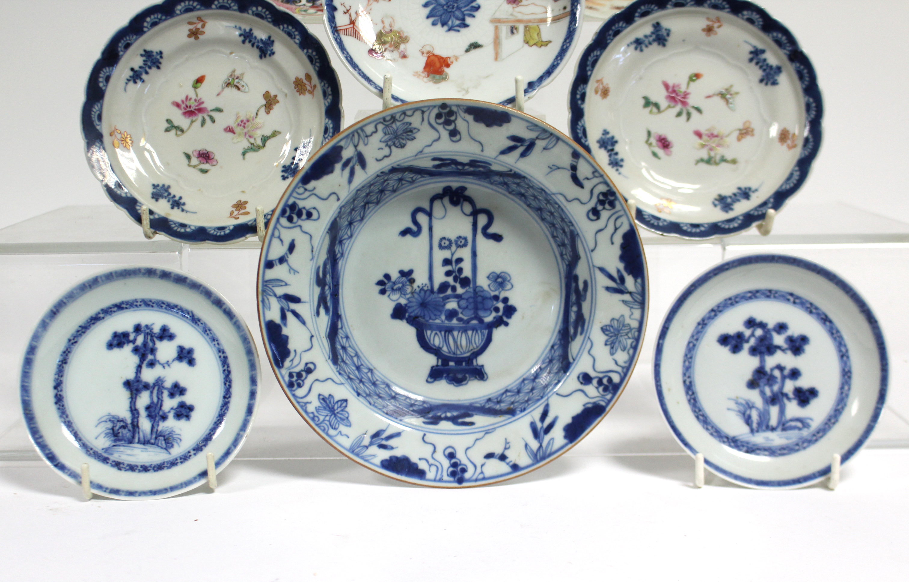 A pair of 18th century Chinese blue-&-white porcelain “Nanking Cargo” saucers painted with pine - Image 2 of 5