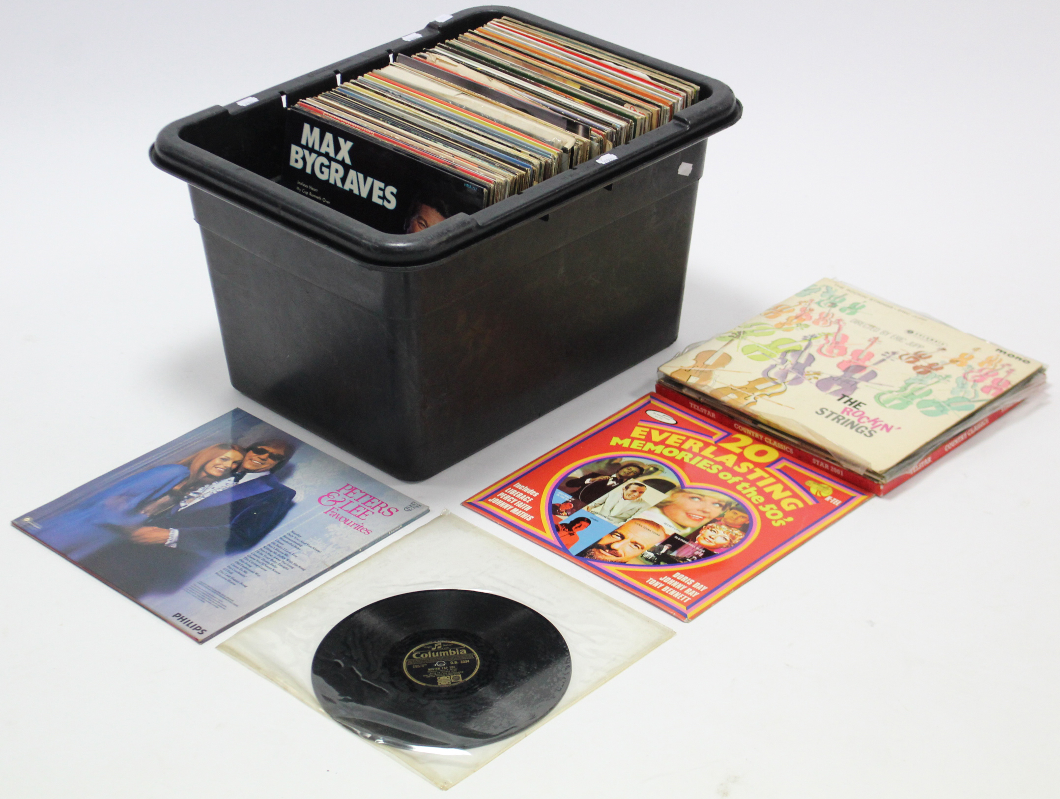 Approximately eighty various L. P. records – pop music, etc.