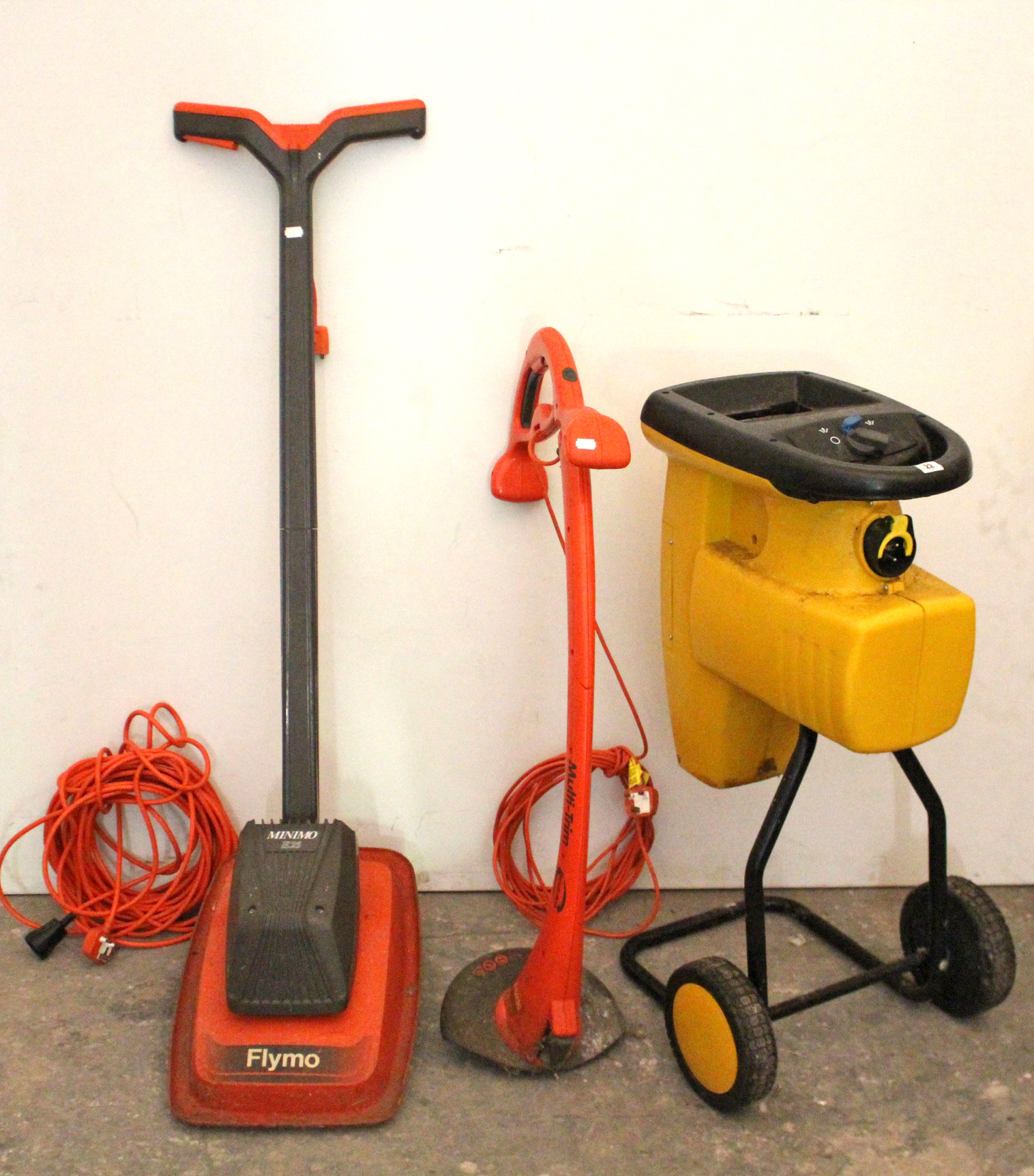 An Alko silent power 4000 garden shredder; a Flymo “Minimo E25” lawnmower; & a ditto garden