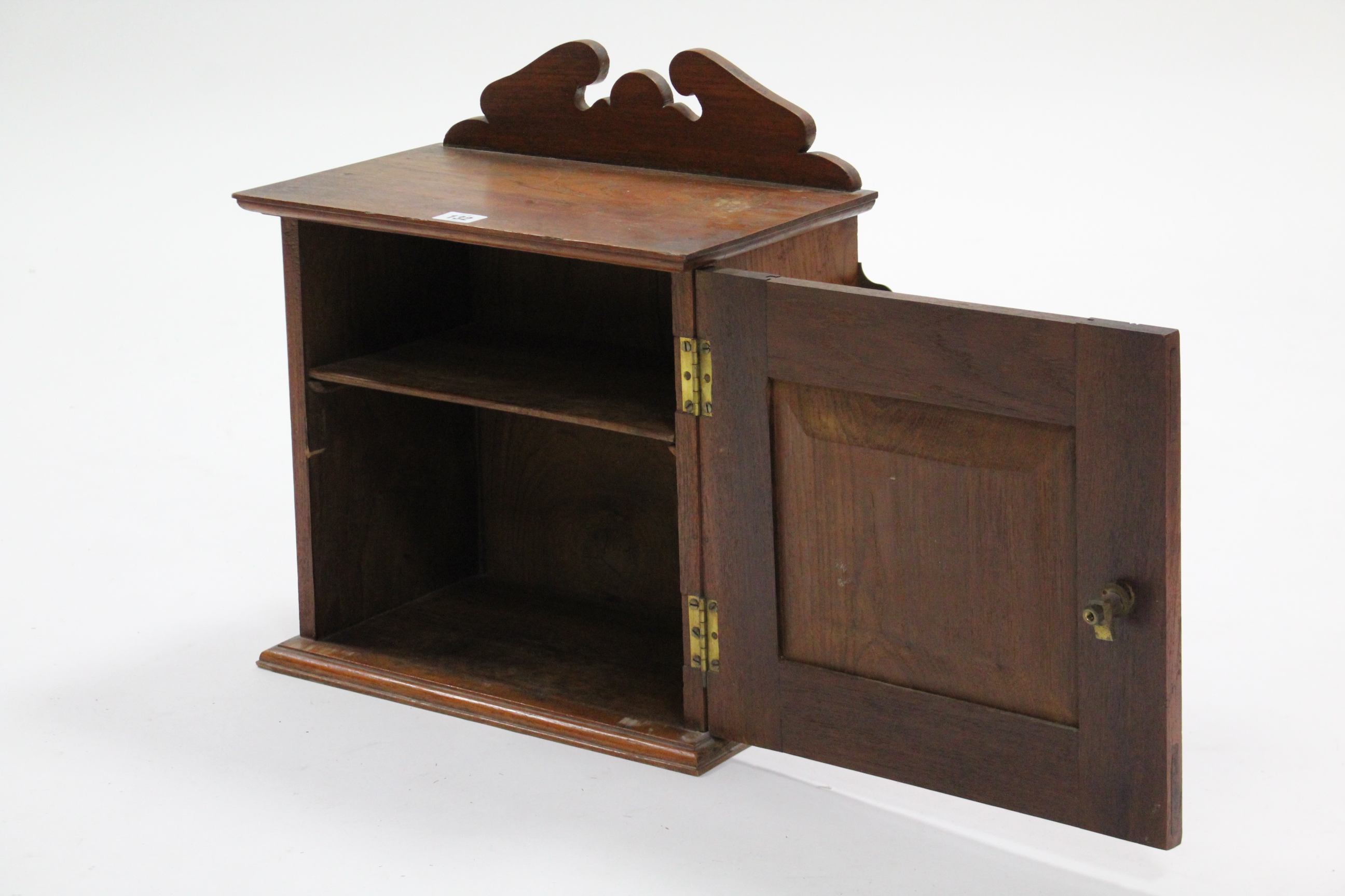 An early 20th century small mahogany wall cabinet, fitted centre shelf enclosed by panel doors, - Image 2 of 2