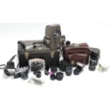 An Asahi Pentax camera; two Polaroid cameras; a Tamron zoom lens; various other cameras; & an