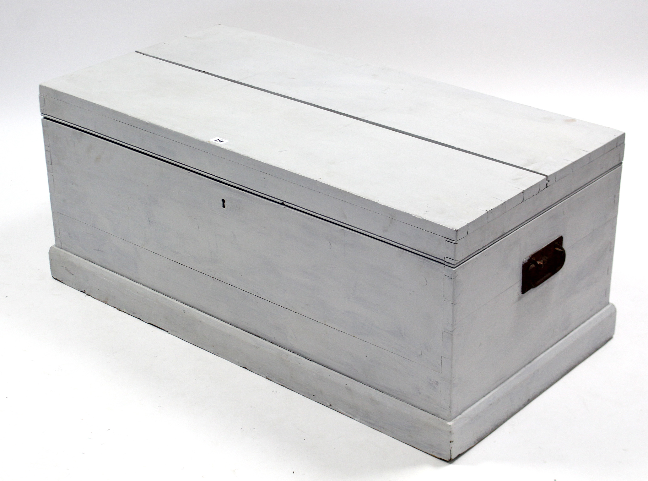 An early 20th century light grey painted deal storage trunk with hinged lift-lid, wrought-iron