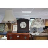 An Edwardian mantel clock in inlaid mahogany case, 11¾” high; together with five wall mirrors;