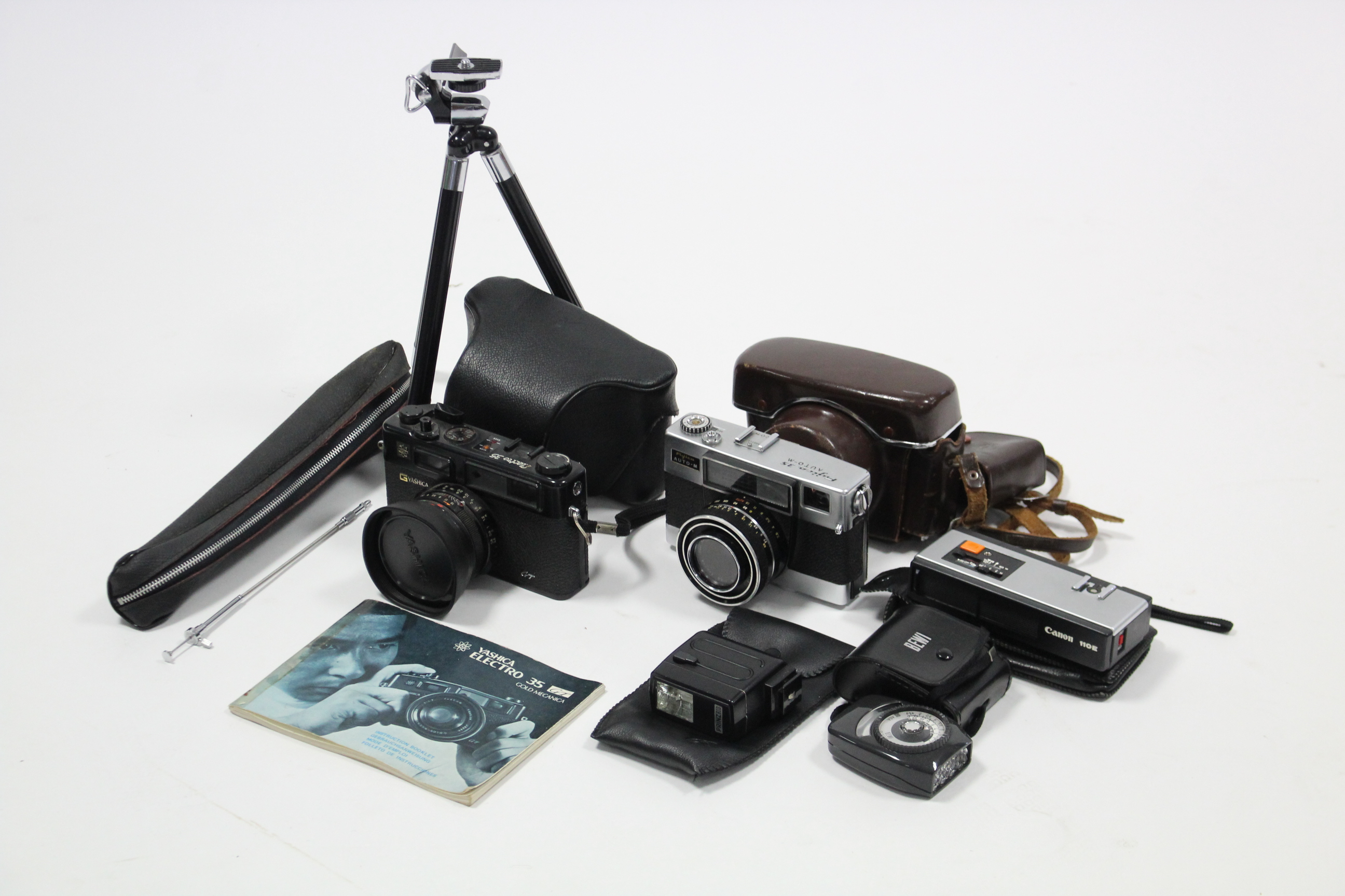 A Yashica “Electro 35” camera; a Fujica 35 camera; a Canon “11OE” camera; & various camera