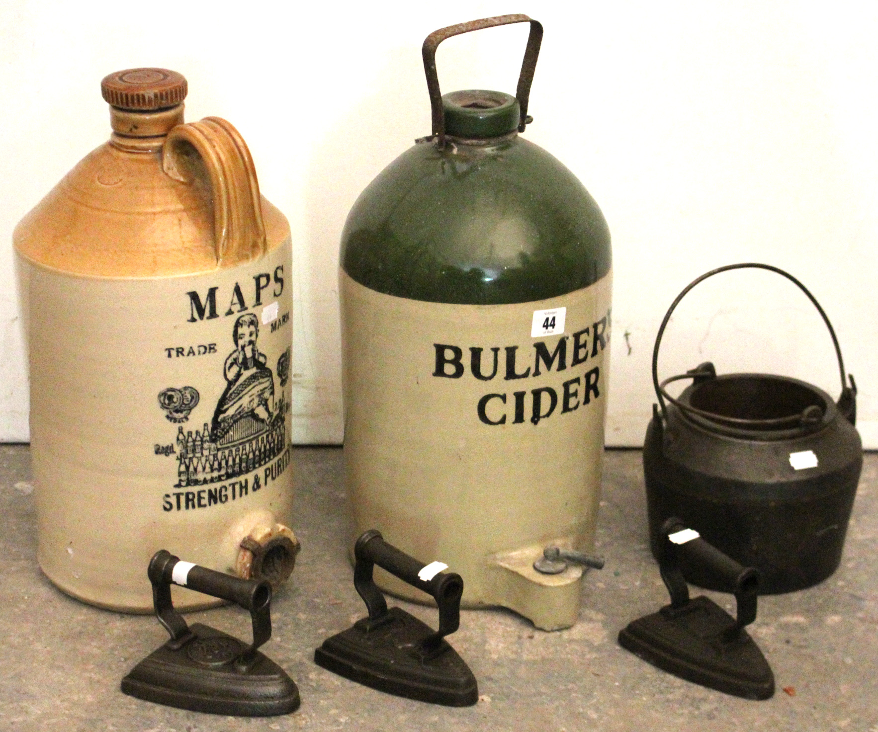 Two stoneware flagons “Bulmers Cider”; & “Maps Strength Purity; an iron glue pot; & three flat-