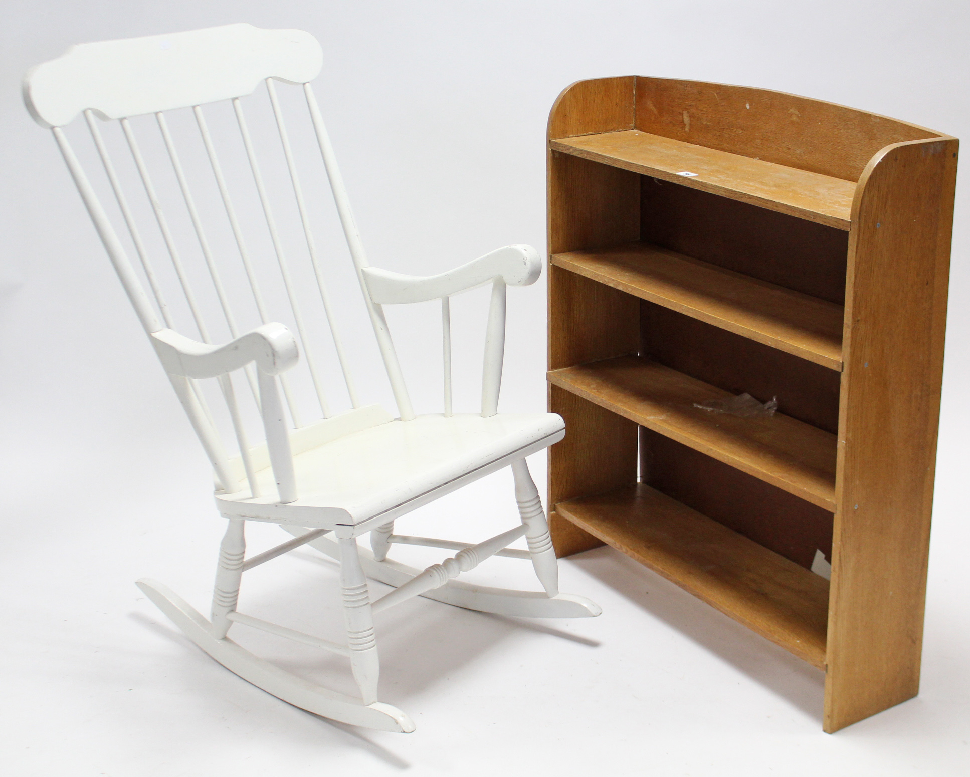 An oak four-tier standing open bookcase, 30” wide x 36” high; & a white painted wooden spindle-