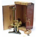 AN EARLY 20th century BRASS MONOCULAR TELESCOPE by HUSBANDS & CLARKE of BRISTOL; together with