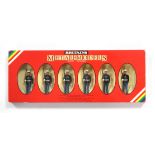 A set of Britains figures “1 US Marine Sergeant 5 Marines Marching” (No. 7302), boxed.