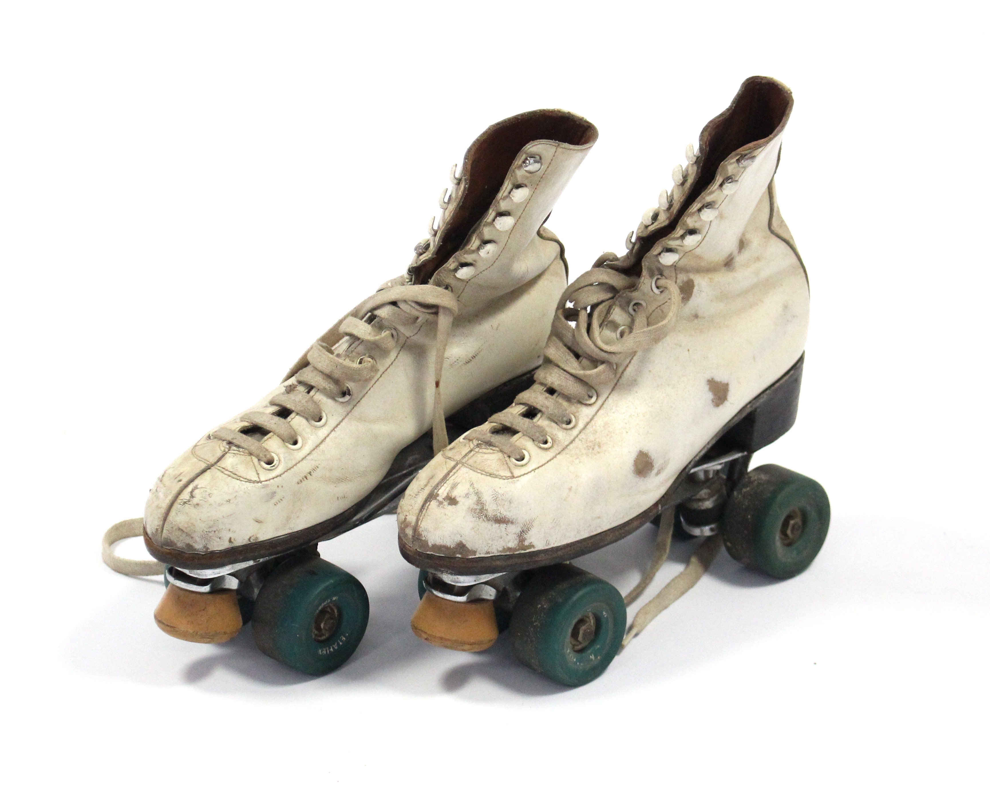 A pair of Hamaco “Super Sportsman” roller skates (sixe 6); together with three cane fishing rods.