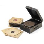 A Columbia portable gramophone in black fibre-covered case; & approximately thirty various records.