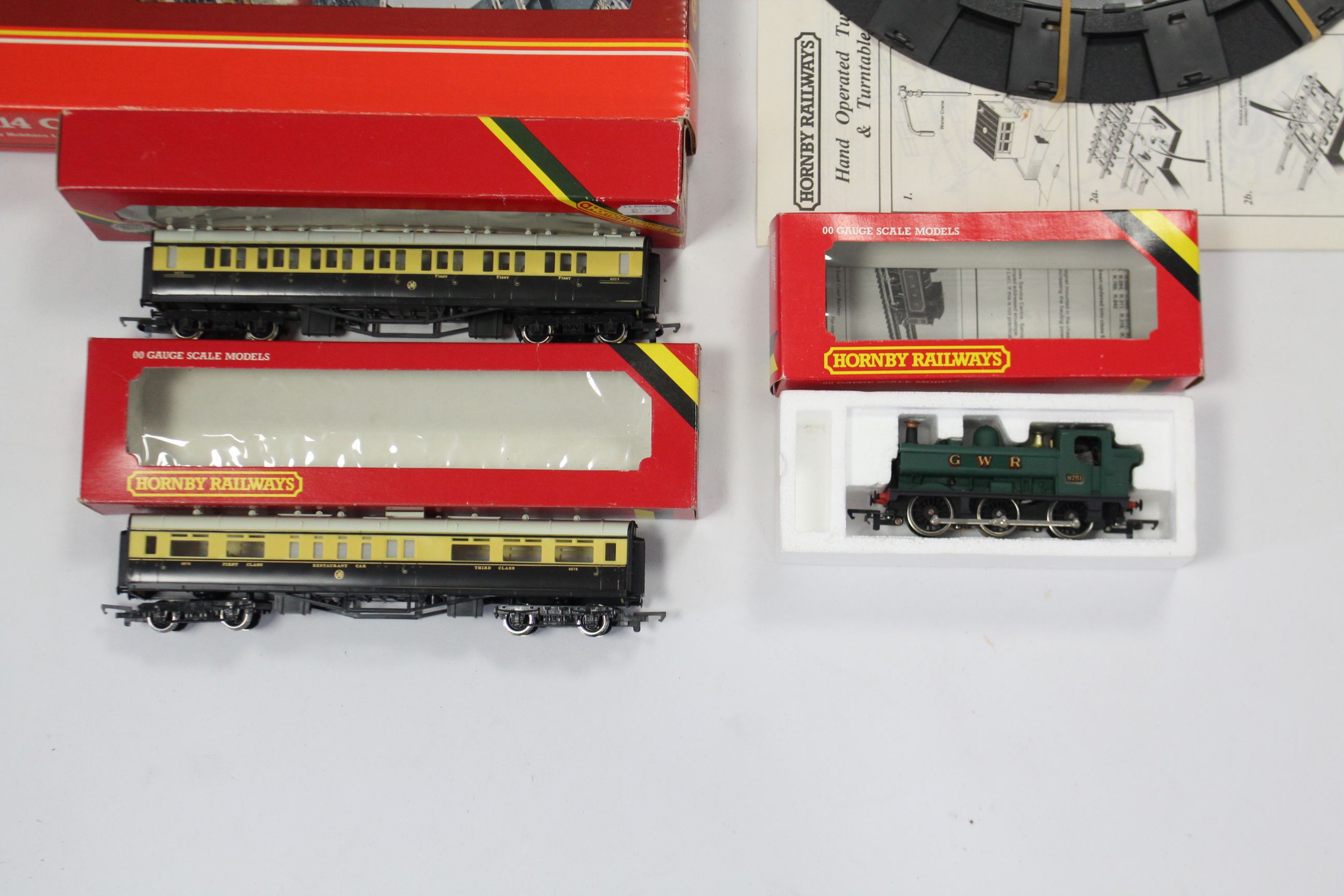 A Hornby railways “OO” gauge scale model “G.W.R.57 XX 0-6-0 Pannier Tank; two ditto model coaches; & - Image 2 of 2