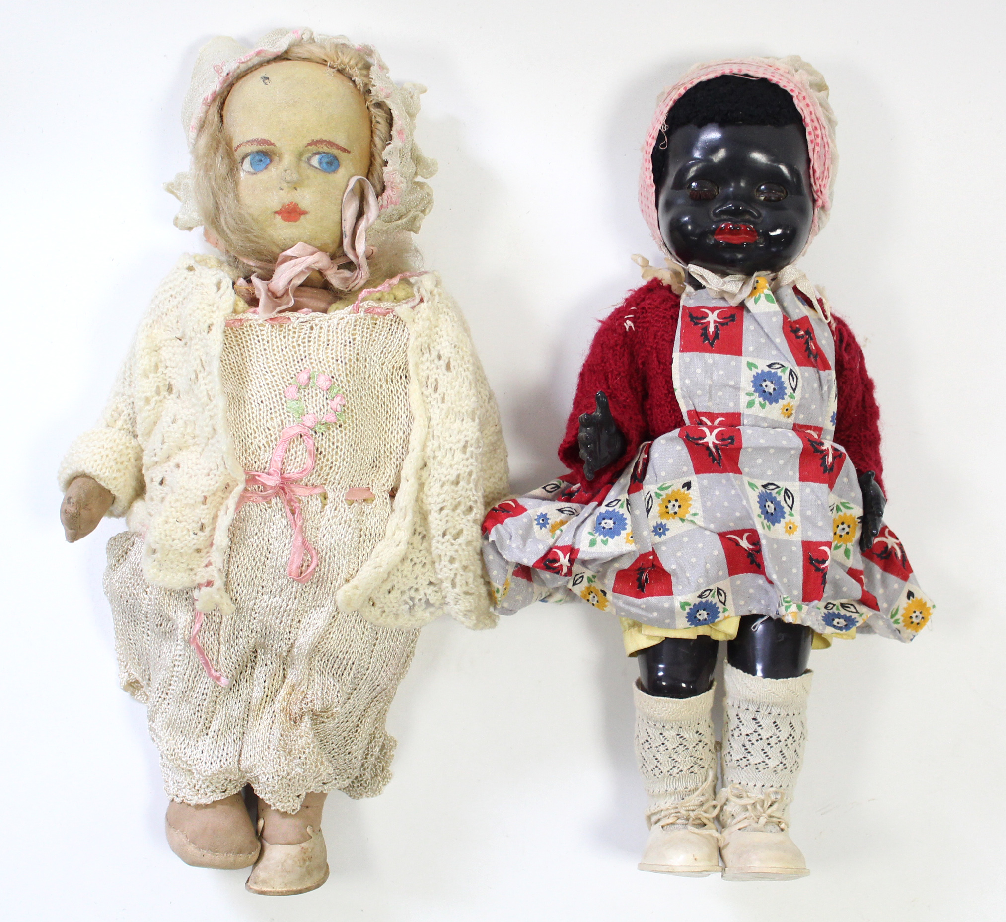 A Lenci-type fabric girl doll with painted features, 16½” high; & a Pedigree black girl doll, 16”