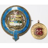 A 1920’s 9ct gold enamelled model awarded to “P.C.L. J. COULSON DIV 2, 1928”; & a sterling silver