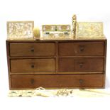 A collection of various antique ivory; bone & treen furniture fittings, box panels, fan segments,