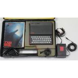 A Sinclair “2X81” portable computer, cased.