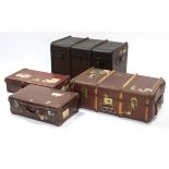 Two fibre-covered ribbed travelling trunks, 37”, & 34½” wide; & two suitcases.