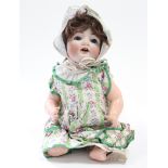 A German bisque head girl doll (1296 Germany 40) with blue sleeping eyes, open mouth, &