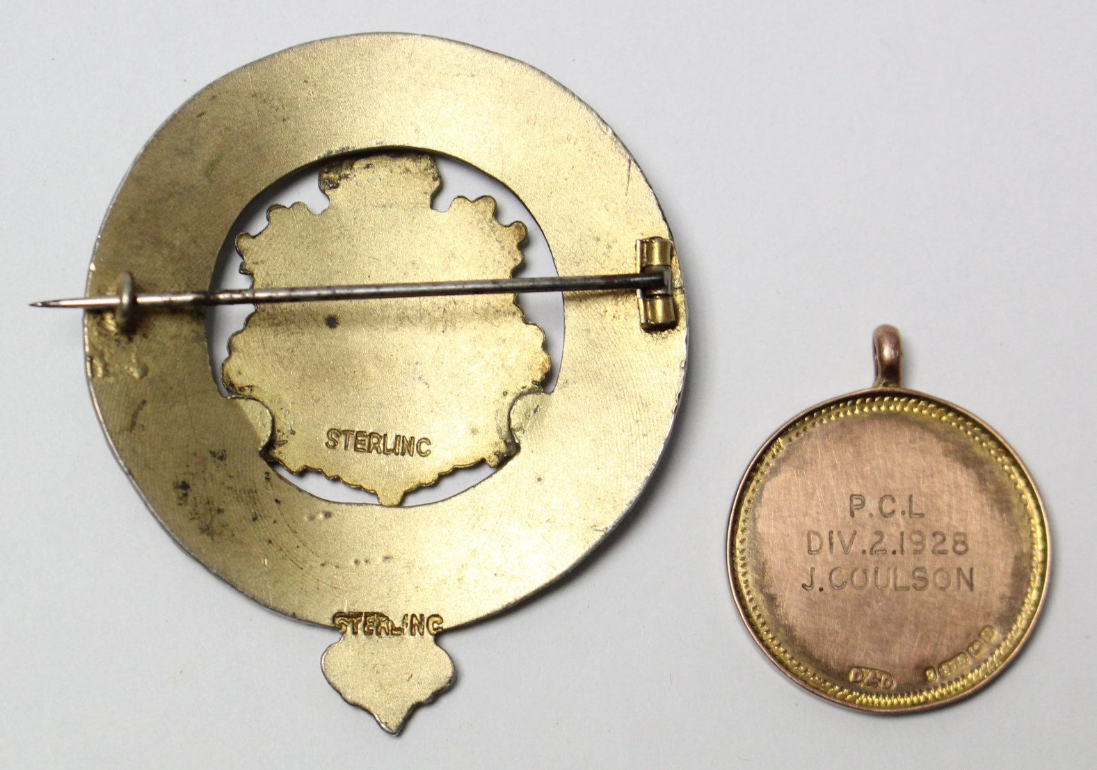 A 1920’s 9ct gold enamelled model awarded to “P.C.L. J. COULSON DIV 2, 1928”; & a sterling silver - Image 2 of 2