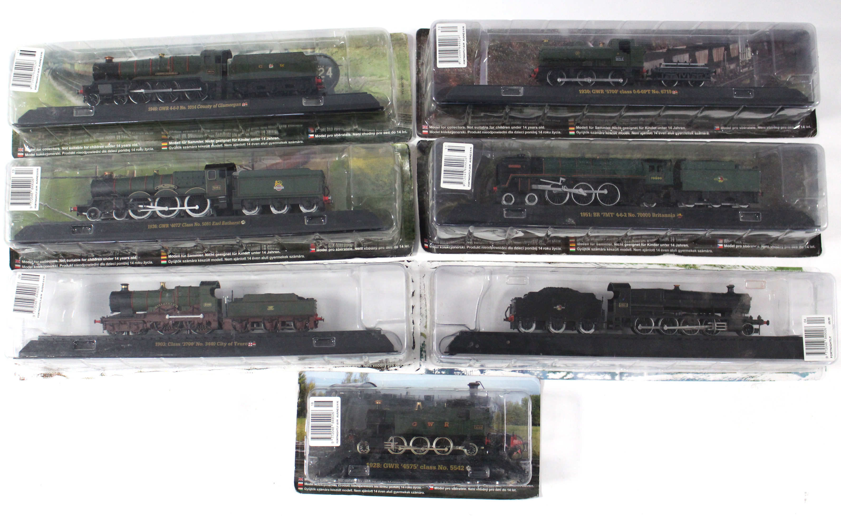 Seven Amer Co. scale model locomotives, each with window box.