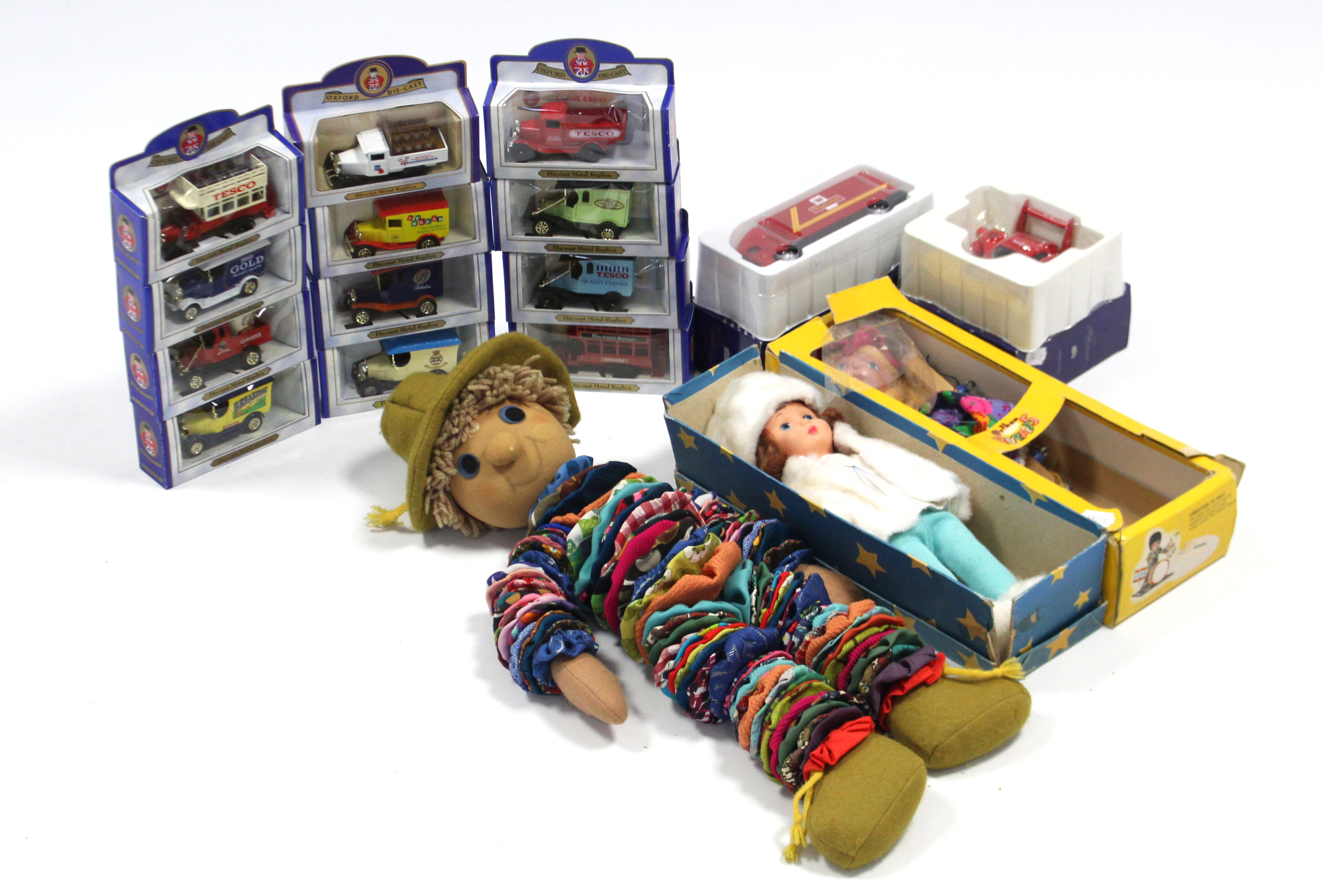 A Pelham string puppet, boxed; a celluloid doll; a soft toy; & fourteen various scale model