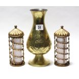 A Jone & Willis brass ovoid vase with raised geometric design, 9¼” high; & a pair of gilt-metal