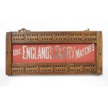 A treen cribbage board inset mirrored panel “USE ENGLAND’S GLORY MATCHE’S”, 4¾” X 10½”.