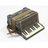 A Hohner “Carmen I” piano accordion, lacking carrying case.