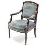 A Louis XV1-style carved wooden frame elbow chair with padded seat & back upholstered mauve