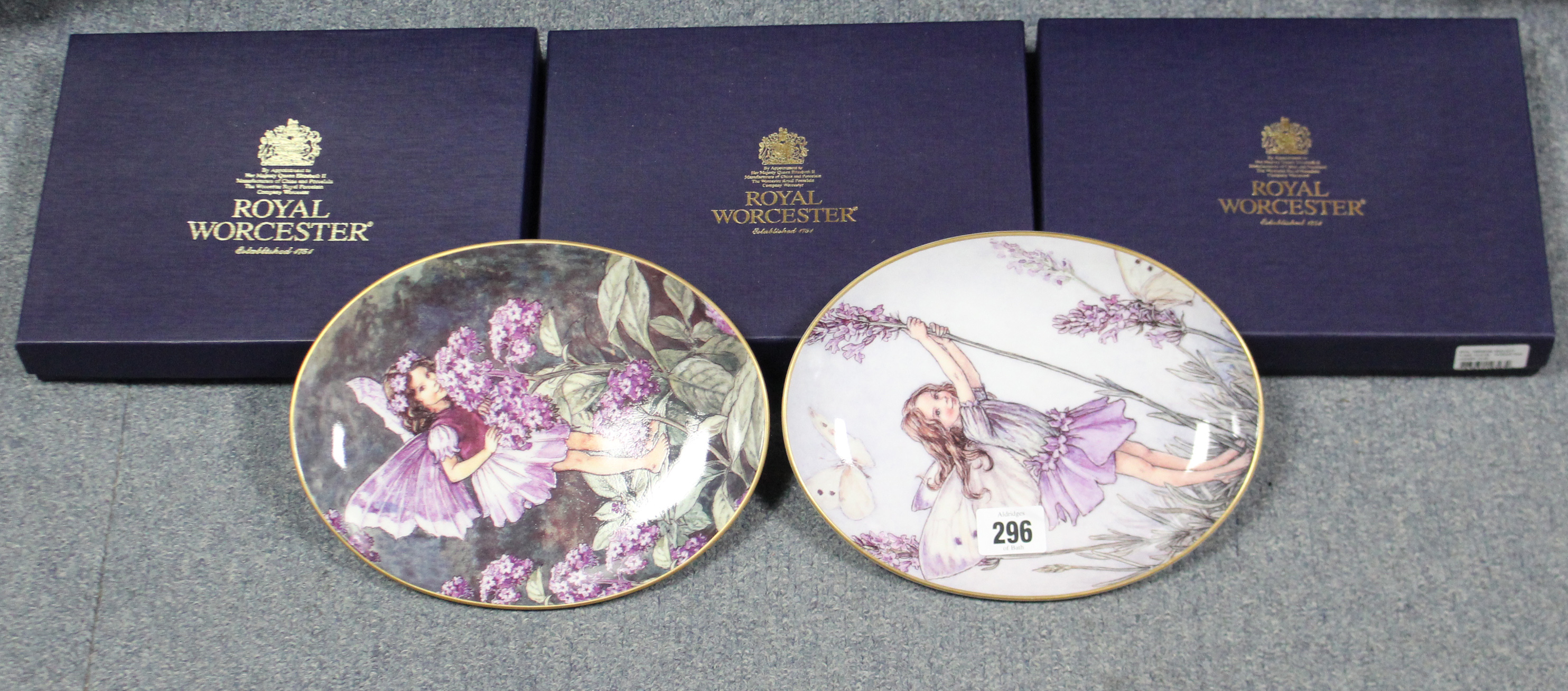 Eight Royal Worcester “Flower Fairies” collector’s plates; a Gladstone-type bag; various children’