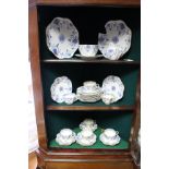 A Coalport blue & white floral decorated thirty-two piece part tea service; & a Minton’s “Haddon