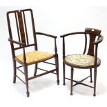 An Edwardian inlaid-mahogany tub-shaped chair with padded oval seat, & on round tapered legs with