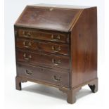 An Edwardian inlaid-mahogany bureau, with fitted interior enclosed by fall-front above four long