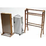 A walnut towel-horse, 25” wide; together with a modern rug; a trouser press; & a heater.