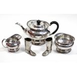 A silver-plated three-piece tea set of globular form; & a pair of silver-plated novelty book weights