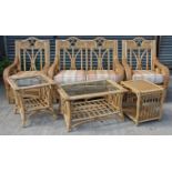 A rattan six-piece conservatory suite comprising a two-seater settee, 49” long, a pair of armchairs,