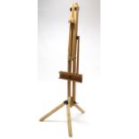 A Windsor & Newton beech portable artist’s easel, 62¼” high.